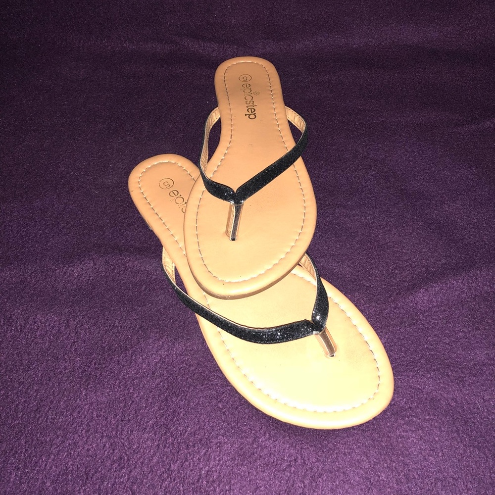 Sparkly black flip flops